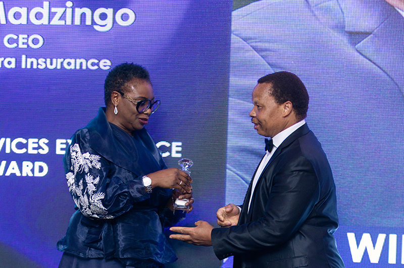Diaspora Insurance CEO Jeff Madzingo (right) receiving his award