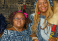 Alphonsine Djiako Leuga and her daughter Loraine Choulla pictured together in traditional African attire, honoring their heritage.