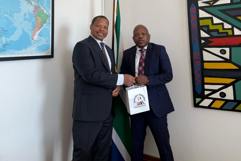 Jeff Madzingo, CEO of Diaspora Insurance, meeting Zambia’s High Commissioner to Australia, Dr Elias Munshya, during his Australia visit.