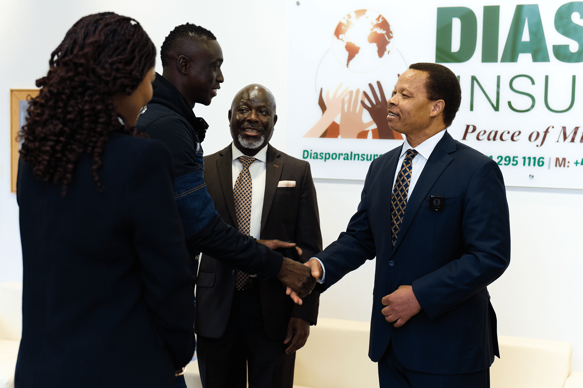 Papiss Cissé with Diaspora Insurance CEO Jeff Madzingo and Channels Director Edwin Tswere at Diaspora Insurance House