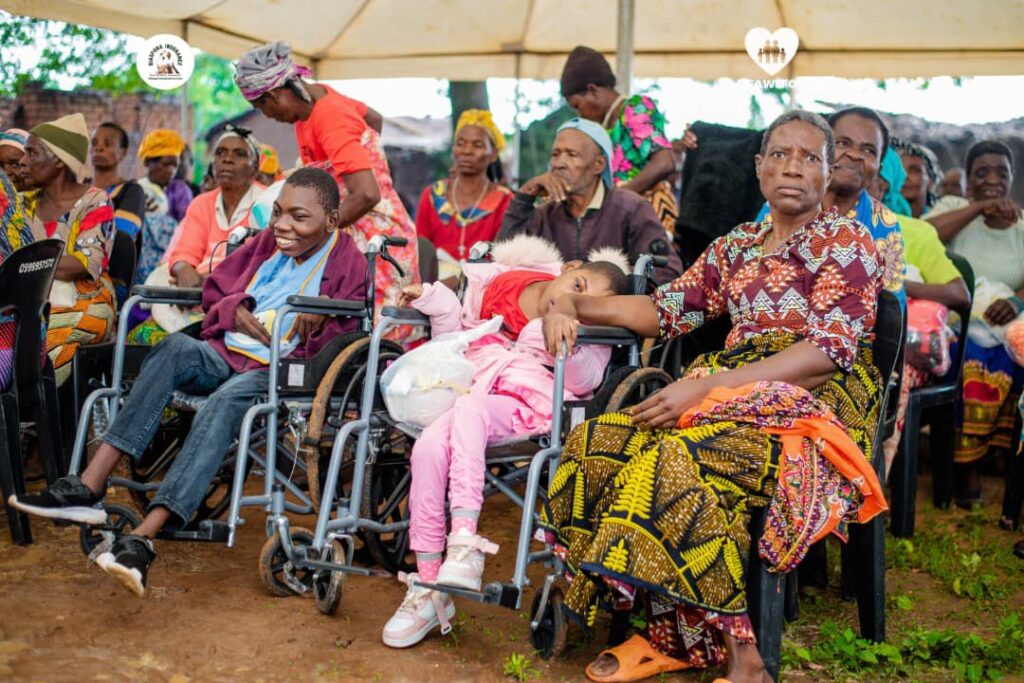 Wheelchair beneficiaries supported through a donation by Diaspora Insurance in partnership with Family Wellbeing in Malawi.