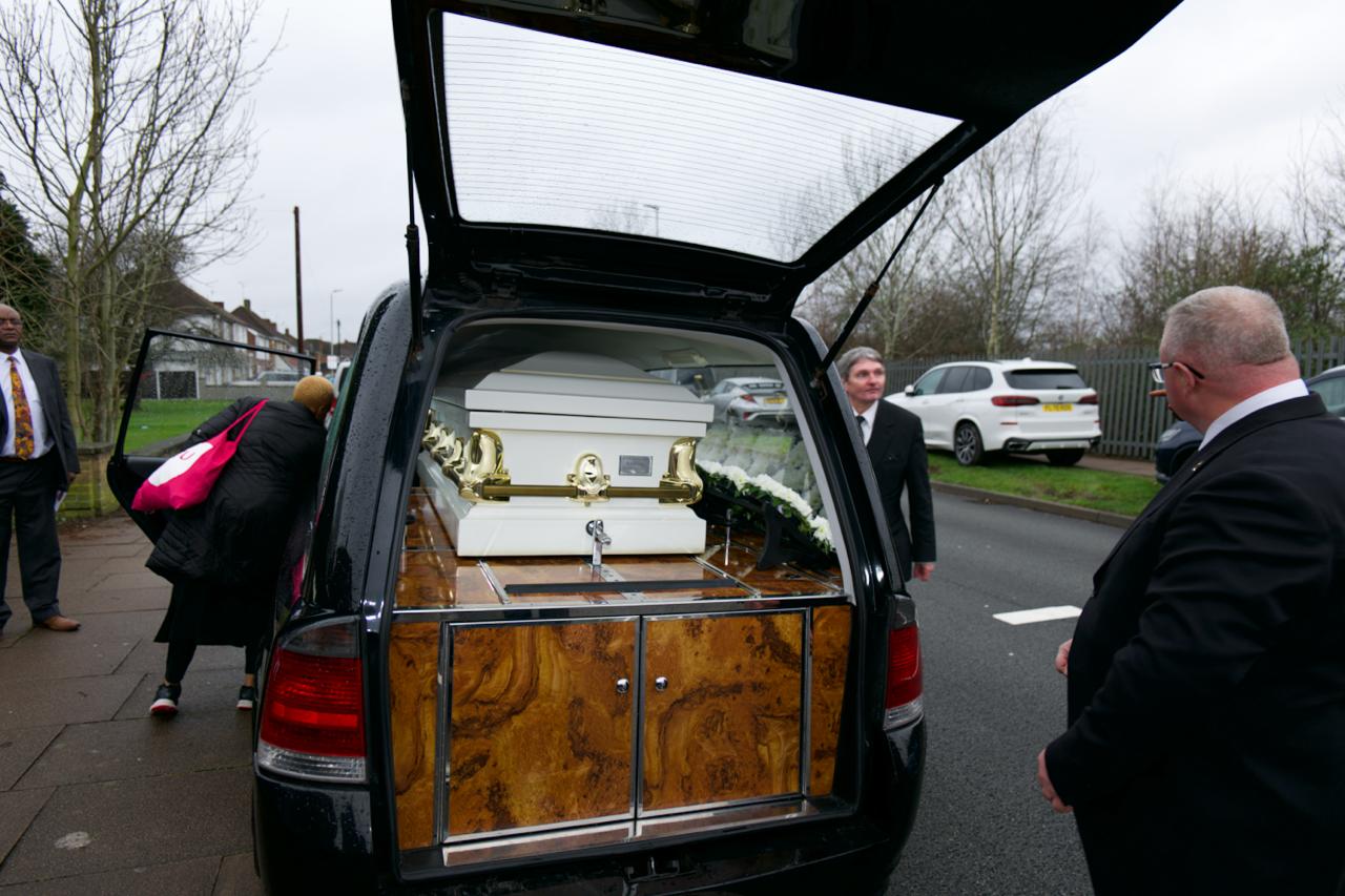 The hearse carrying Judith Sithole as it departs Mayflower Methodist Church en route to Gilroes Cemetery in Leicester.