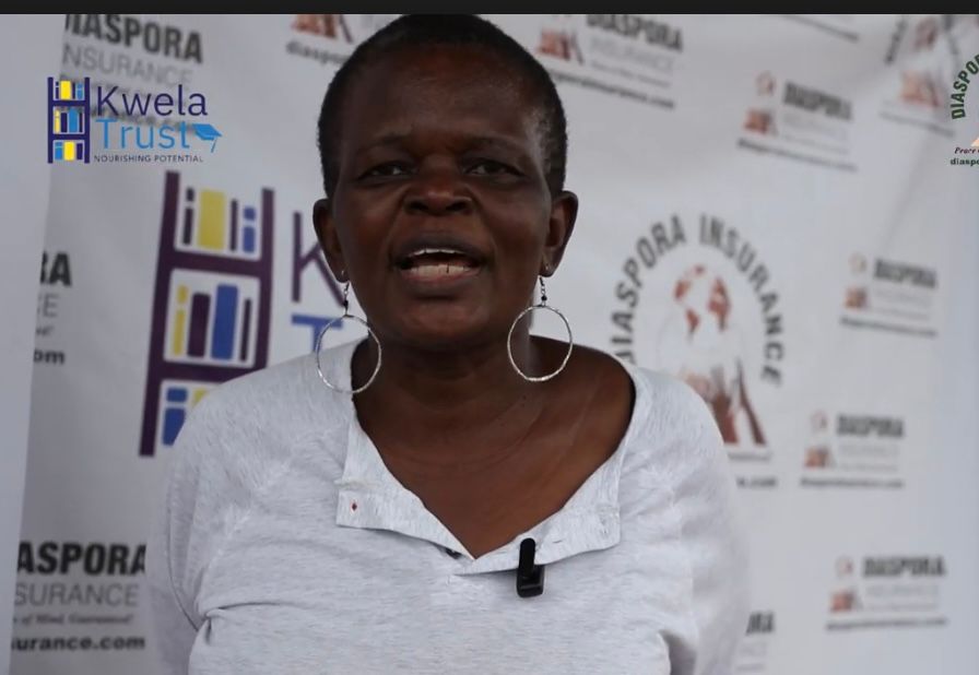 Laura Miti of Kwela Trust thanking Diaspora Insurance for sponsoring the Children’s Christmas lunch.