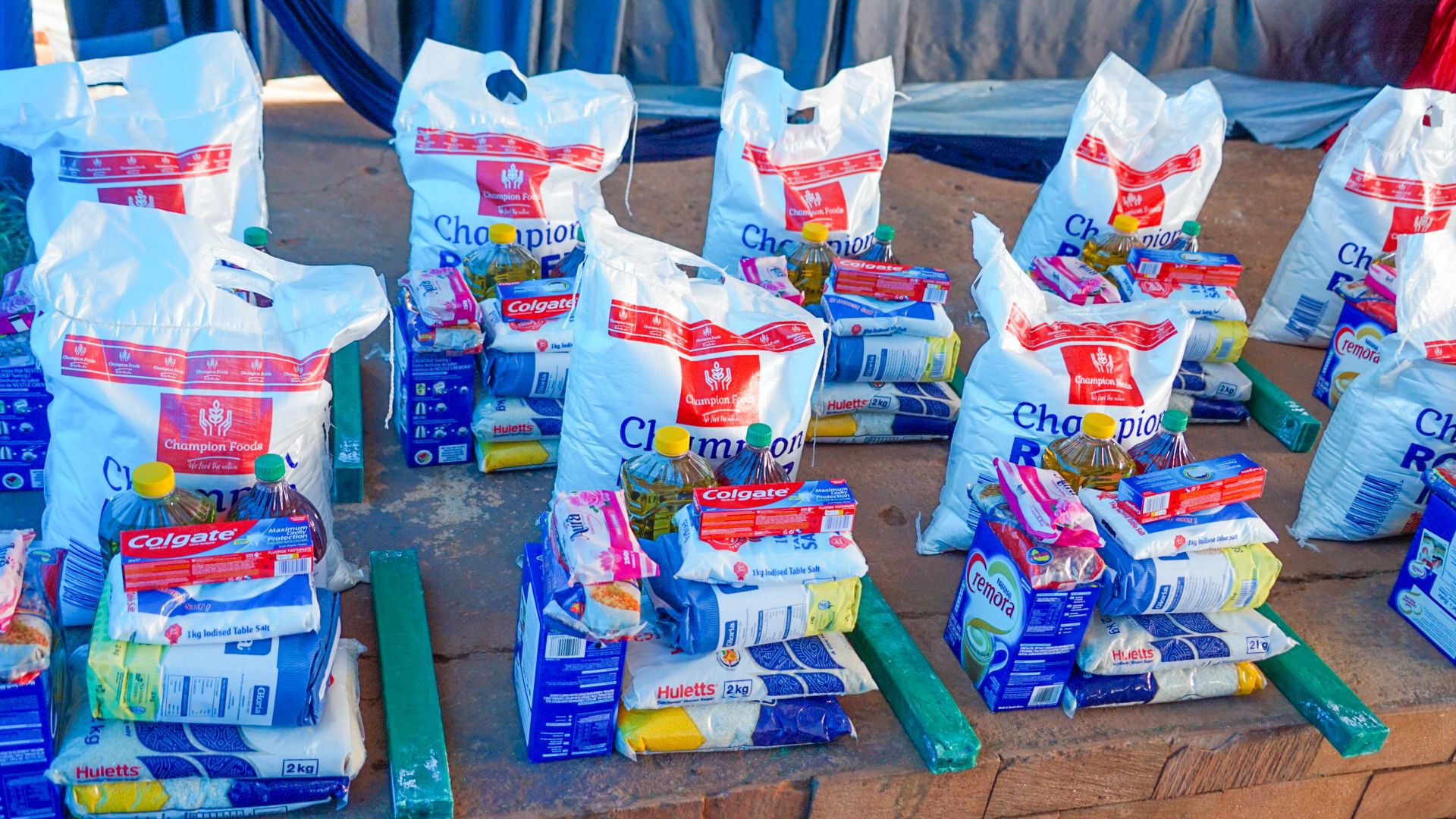 Elderly residents in Harare receiving festive food hampers from Diaspora Insurance&rsquo;s Giving Back Initiative to support the community during December.