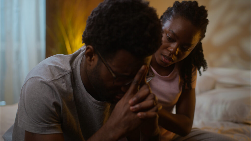 What Families Face in the First 72 Hours After a Death Abroad, showing a grieving family navigating shock and uncertainty after a loss overseas.